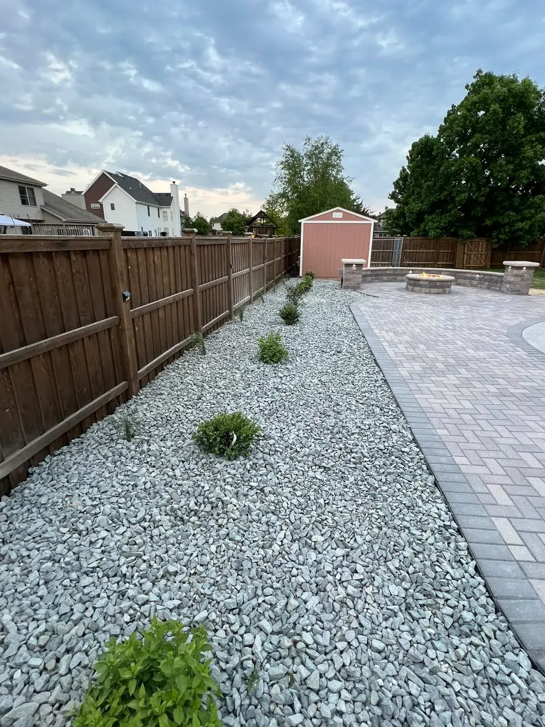 Landscape stone accents around entry beds in Morris, IL